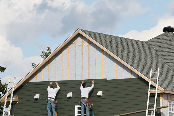 Professional Wood Siding technician working in Brookville, NY